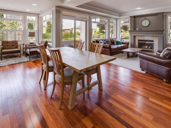 New hardwood flooring in an open concept dining room