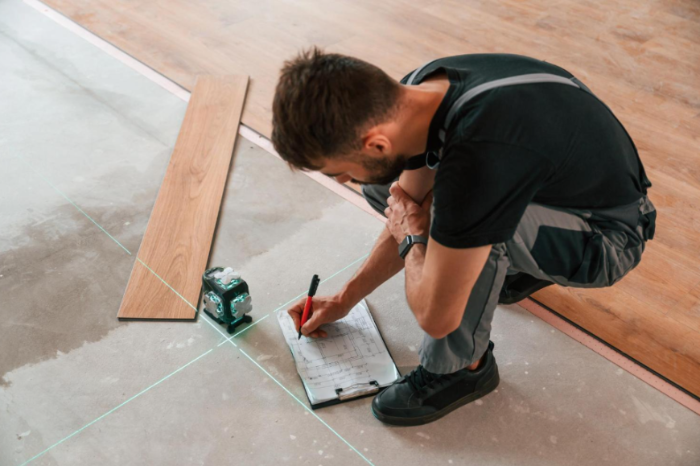 Contractor Installing a Hardwood Floor